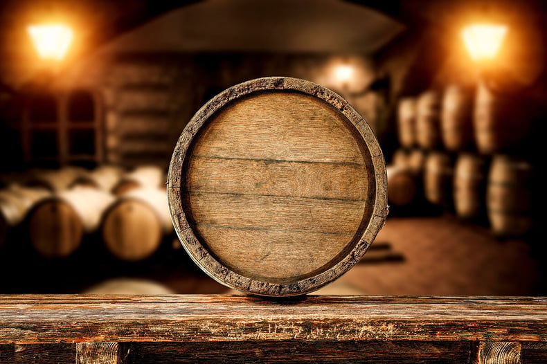 Closeup of whisky barrel in warehouse